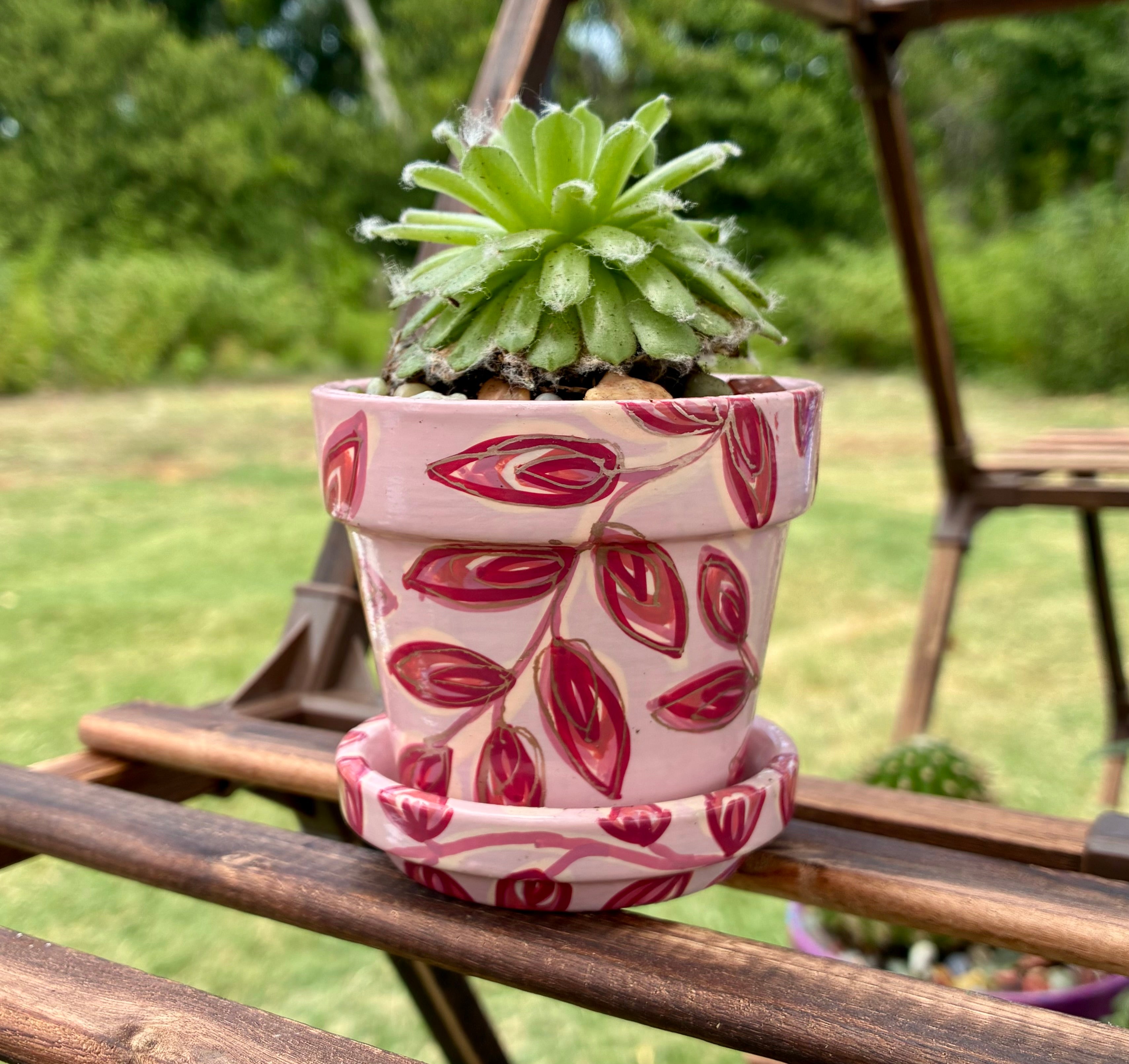 Layered Leaves- reds and rose gold on peach